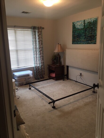 Bedroom 4 has a larger window looking out over front of house, and has sliding door closet. - 3809 Willie Mays Ln
