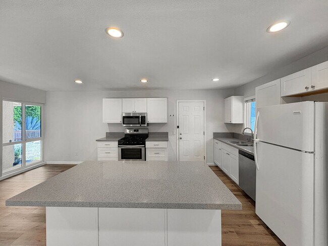 Building Photo - SD: Spacious 3BD/2BA Home in Oceanside with Large Backyard, In-Unit Laundry & Attached Garage