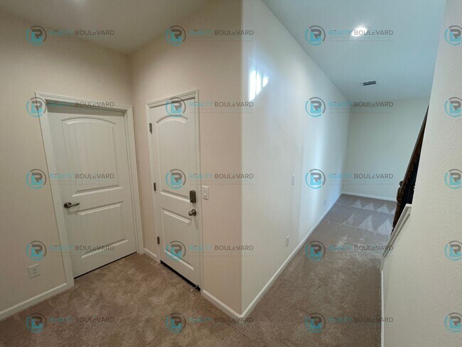 Building Photo - Luxury and Convenience Fully Equipped 3-Bedroom 2.5 Bathroom 2 Car Garage Townhome in Carson City
