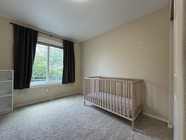 Building Photo - Spacious 3-Bedroom Home with Two Living Areas, Private Balcony, Fireplace & Attached 2-Car Garage