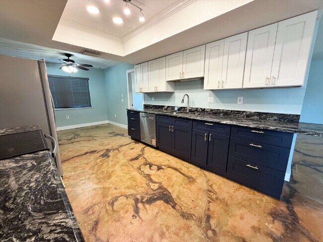 Building Photo - "Waterfront Home with Dock! 3-Bedroom Oasis with 2 Baths and 1,800 Sq Ft of Comfort in Hudson, FL!"