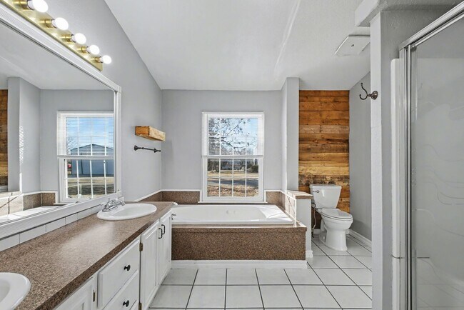 Building Photo - 3-Bed Home with Fireplace, Fenced Yard & Flexible Living Space