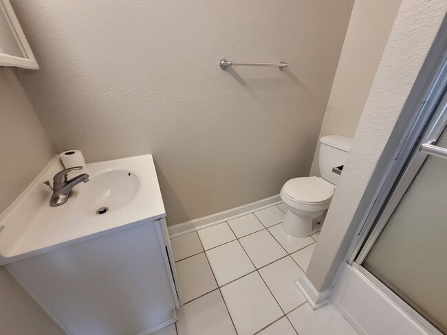 Building Photo - Two bedroom home with partially fenced yard!