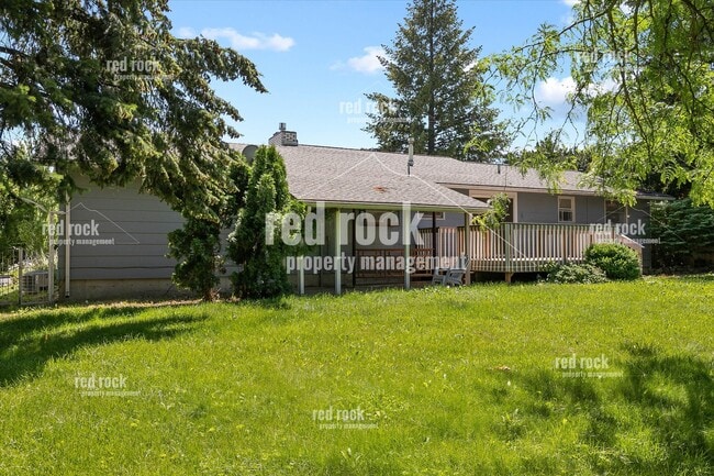 Building Photo - 2211 E 49th Ave