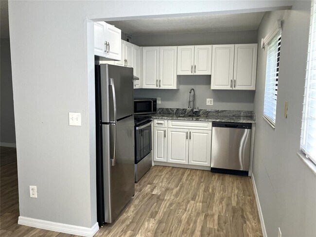 Building Photo - 11703 Raintree Village Blvd