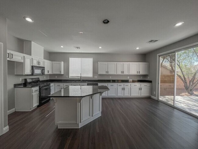 Building Photo - Stunning 5-Bedroom Home in Gated Community...