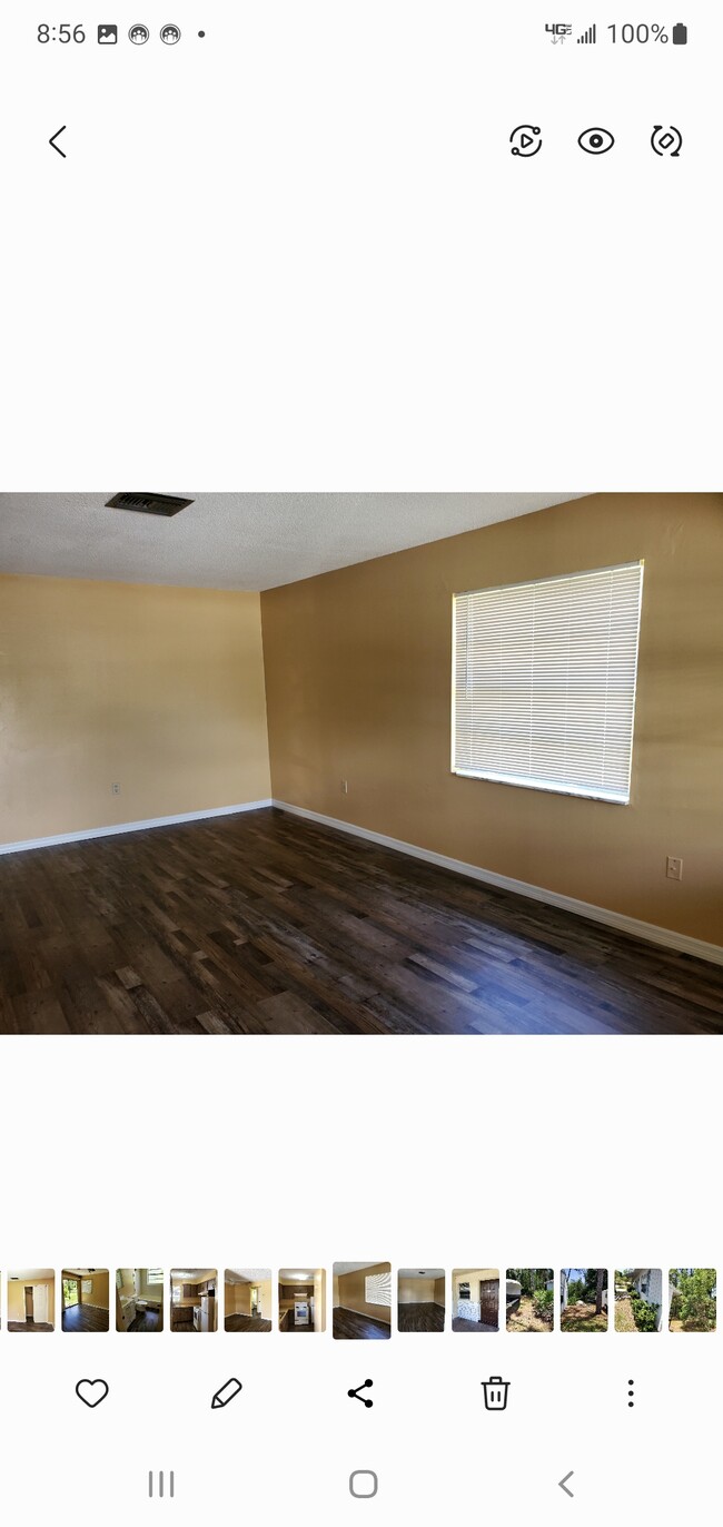 Living room with new floors and interior paint - 6534 West Norvell Bryant Highway