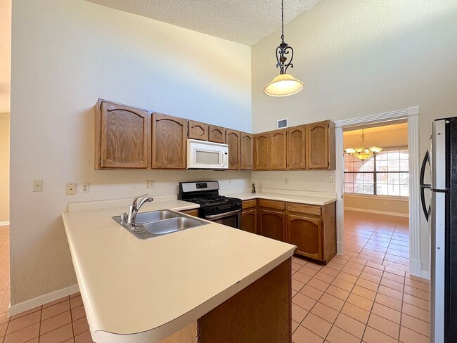 Building Photo - West El Paso 4 bed/3 bath refrig A/C Home!