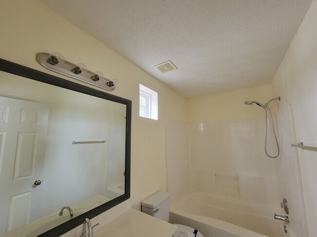 Building Photo - Lake Front Property. Loft - Swim/Tennis - Stainless Steel Appliances