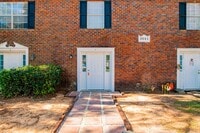 Building Photo - Conveniently Located Furnished Townhome in...