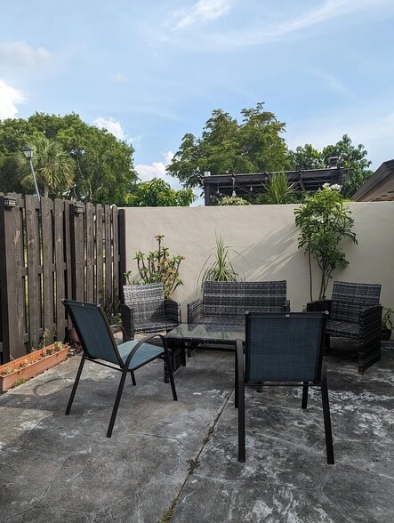 Patio does not include furniture - 13928 SW 52nd Ln