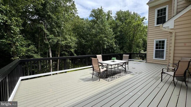 Building Photo - 10899 Woodland Falls Dr