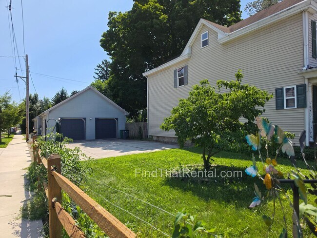 Building Photo - Available August 16! A pet friendly ranch with dishwasher, garage, basement, storage, yard, deck
