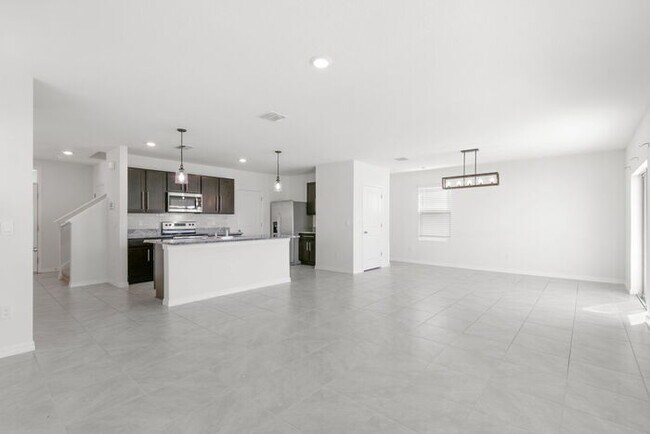 Building Photo - LIKE3 NEW Home For Rent in Avalon Park West!