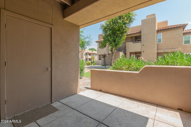 Building Photo - 9450 E Becker Ln