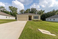 Building Photo - Spacious 4-Bedroom Home in Tara Village – ...