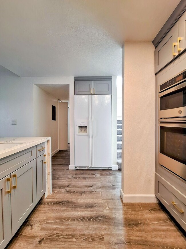 Building Photo - Spacious Two-Story 3bd Townhouse With Private Patios, Balcony, & Garage