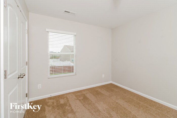Building Photo - 6608 Championship Dr