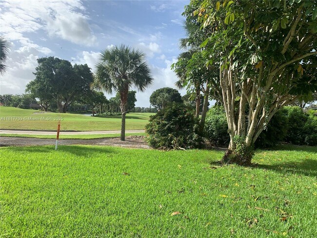 Building Photo - 200 Jacaranda Country Club Dr