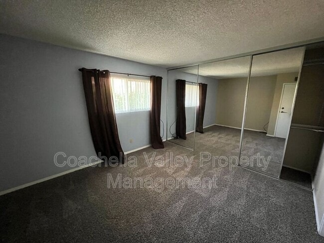 Building Photo - 1950 S Palm Canyon Dr