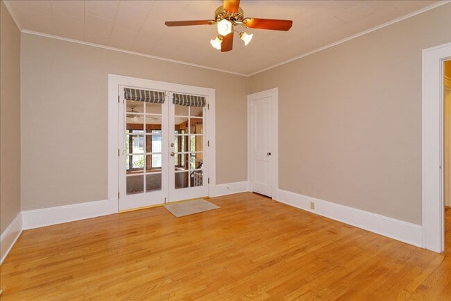 Building Photo - Run don't walk for this one of a kind beautifully maintained Old Florida Charmer on a park like d...