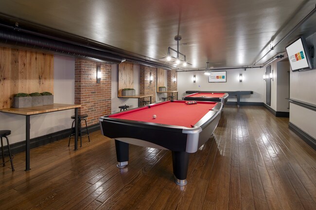Enjoy a game of pool in the Sports Pub at 70 Capitol Yards - Seventy1Hundred