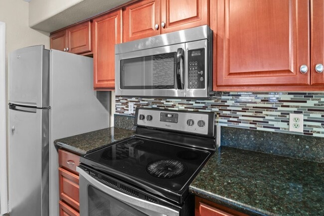 Building Photo - SE!!! Gated!! 1 Bedroom 1st Floor!! One Car Garage!!! Community Pool, Spa, Clubhouse!!! All tile ...