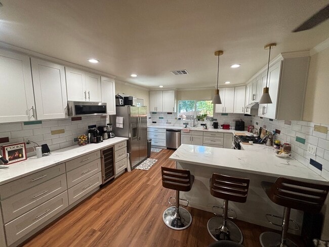 Building Photo - Beautiful Single-Story 4-Bedroom Home with RV Parking in Woodland Hills!