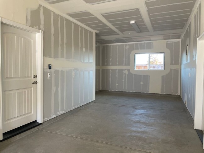 Building Photo - Four Bedroom, Two and a Half Bath Home