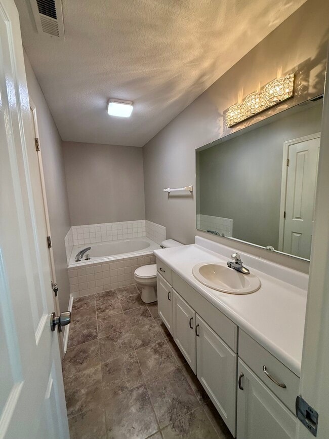 Building Photo - 6065 Woodmill Dr