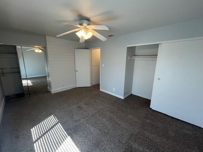 Building Photo - PETS OK!  2-story townhome with 2 bedrooms...