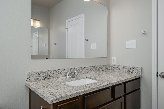 Building Photo - Live, love, and grow in this charming townhome!