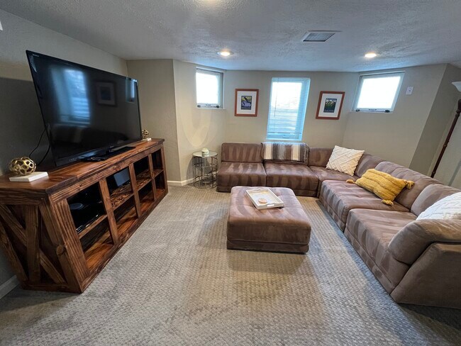 Living room with modular sofa - 2649 W 26th Ave