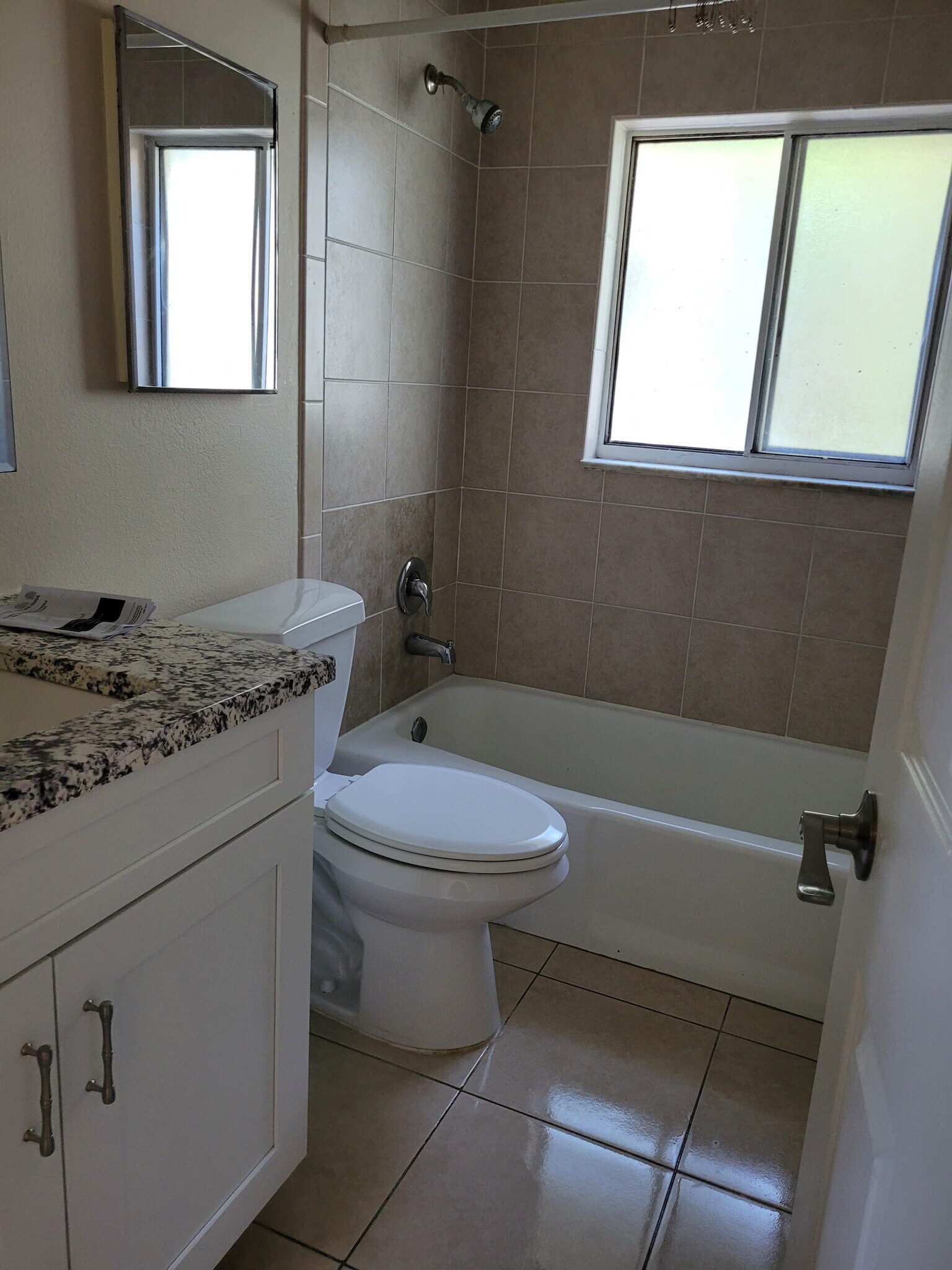 first bath with shower - 23 Crescent Lake Dr
