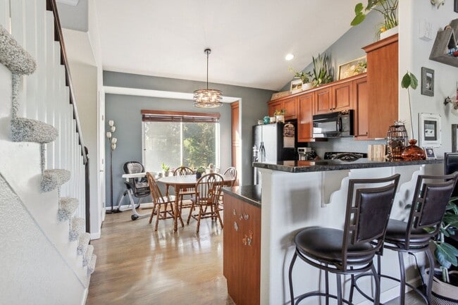 Building Photo - Arvada Townhome with Serene Lake Views