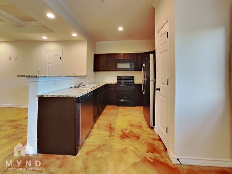 Building Photo - 6415 Melanzane Ave