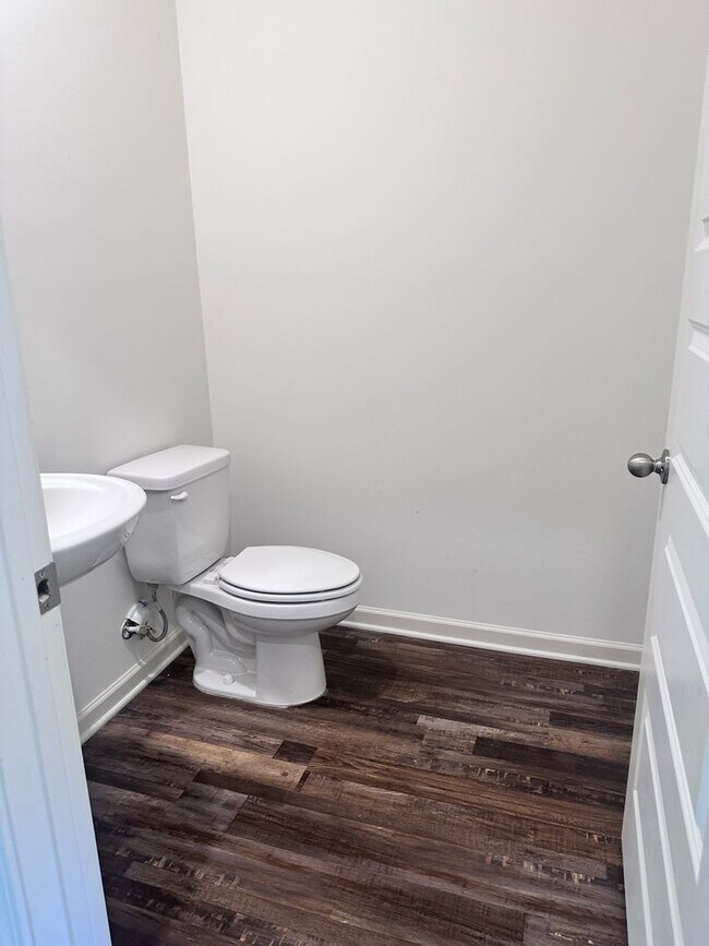 Building Photo - efficient two-level home provides a large living room, 4 very spacious bedrooms, and 2.5 bathrooms