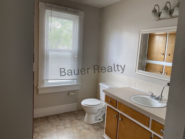 Building Photo - Three Bedrooms, One and a Half Baths
