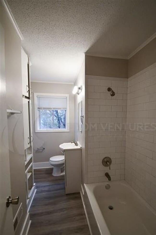 Building Photo - Charming 3BR/2BA Brick Home with Fenced Yard