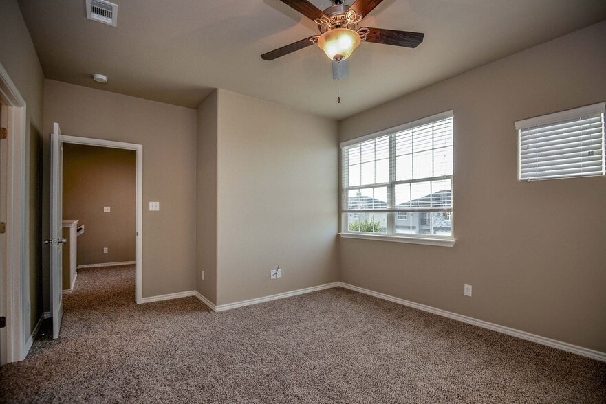 Building Photo - Gap Lease Available! Designer 3/3.5 Townhome with Yard and Garage!
