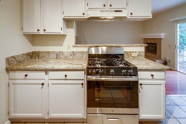 Building Photo - Spacious Townhome in San Marcos, 2-Car Garage, and a Tropical Community Pool!!