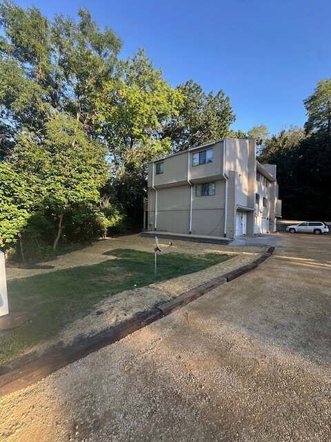 Primary Photo - "Charming 2-Bed Townhome (multiplex buildi...