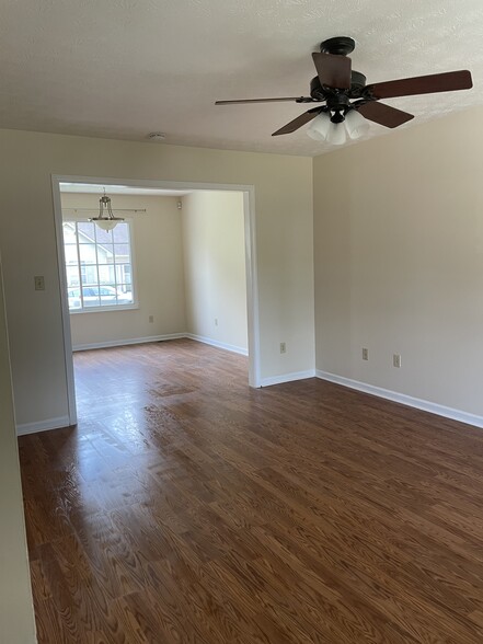 Living Room into dining room - 1216 W Broadway Ave