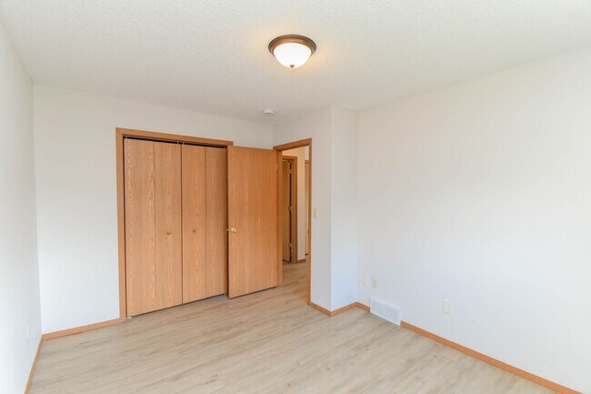 Building Photo - Updated 3BR Split-Level Home with Huge Deck, Fenced Yard & 2-Car Garage Near I-29!