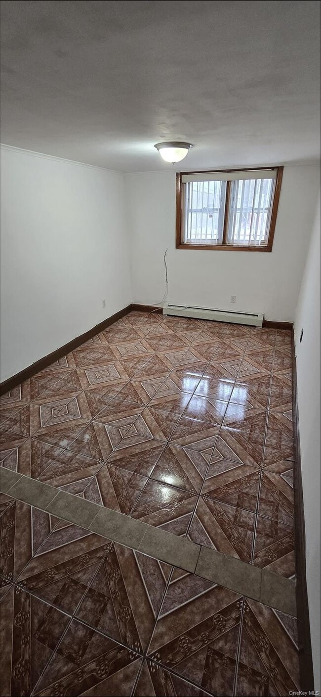 Building Photo - 25-36-36 76th St