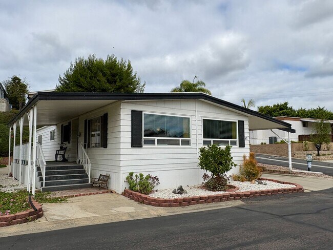 Building Photo - Welcome to the vibrant 55+ mobile home com...