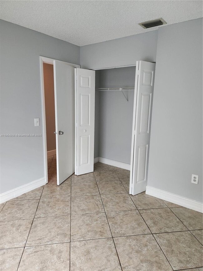 Building Photo - 10960 NW 29th Ct