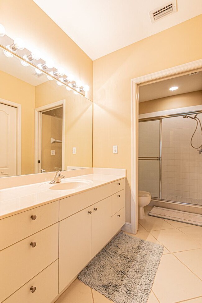 Building Photo - Peaceful Preserve-View Condo in Gated Blue Heron