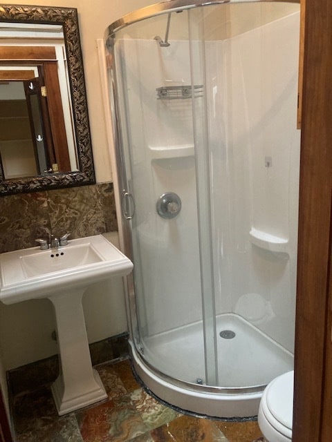 shower and bath with onyx tile - 915 Monastery St