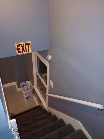 Stairs going upstairs Exit sign removed - 3308 Kirby Ave